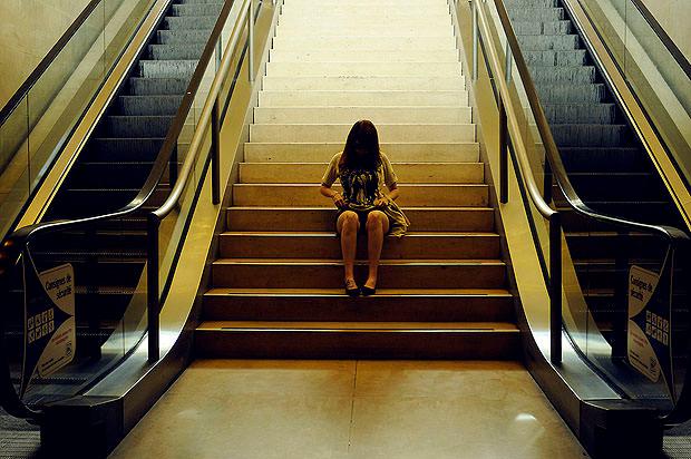 Girl sitting on steps