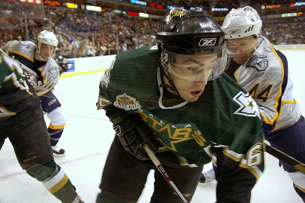 Ice hockey players fighting for the puck