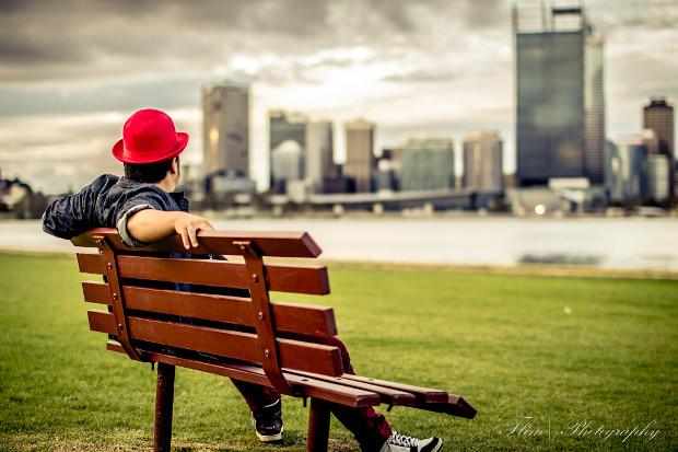 Man looking out to city in the distance