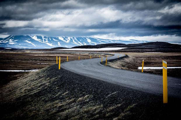 Road winding across icy landscape