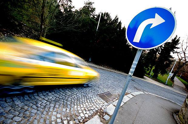 Moving car blurred by a slow shutter speed