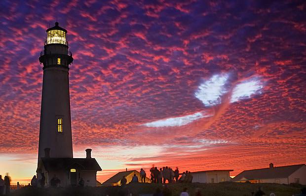 A lighthouse at sunset